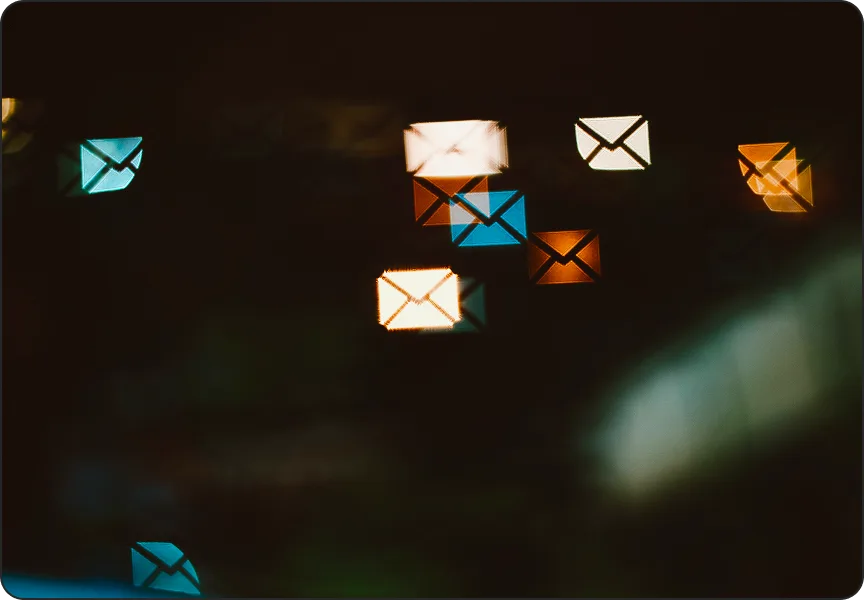 Floating email envelopes representing phishing and fraud awareness